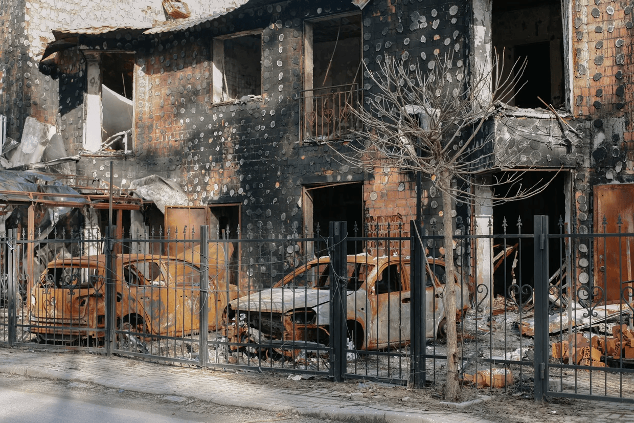 Destroyed residential buildings and burned cars — aftermath of Russian occupation in Bucha, 2022